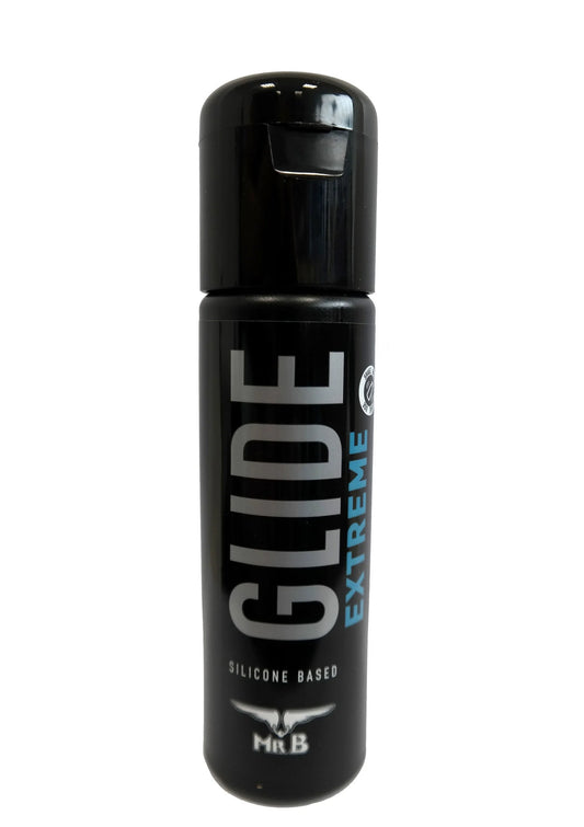 Zwarte glijmiddel-fles met zwarte dop en GLIDE Extreme merknaam Mister B op etiket.