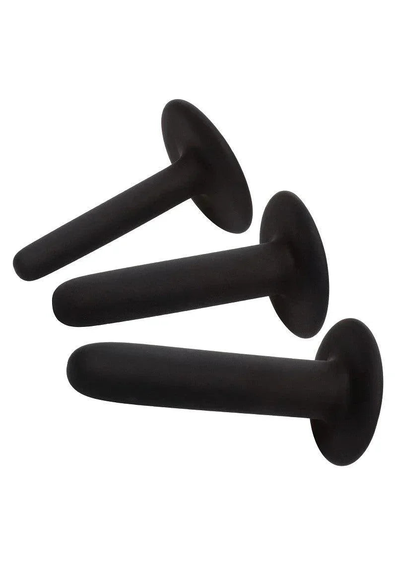 Drie zwarte siliconen kegels met brede basis