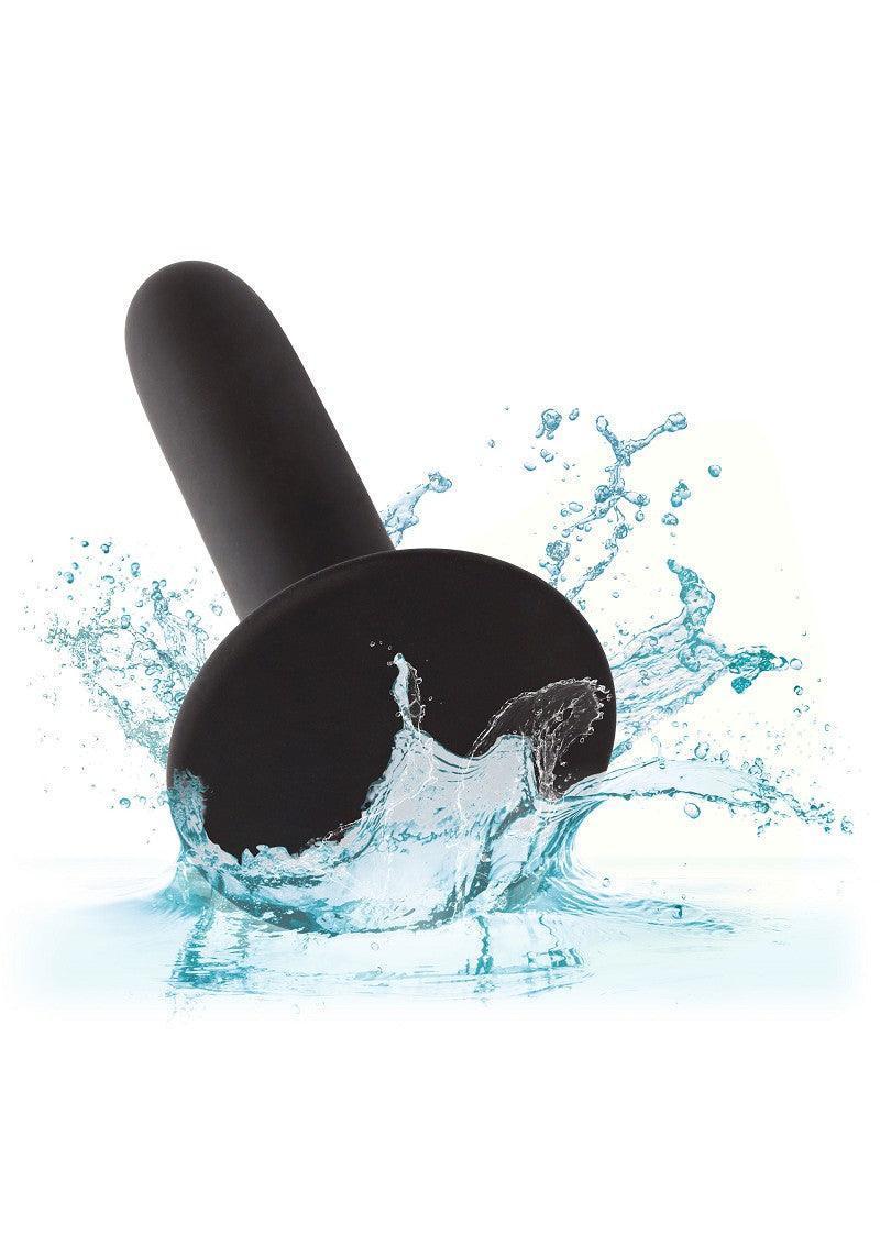 Zwarte siliconen pegging plug met waterdruppels rondom
