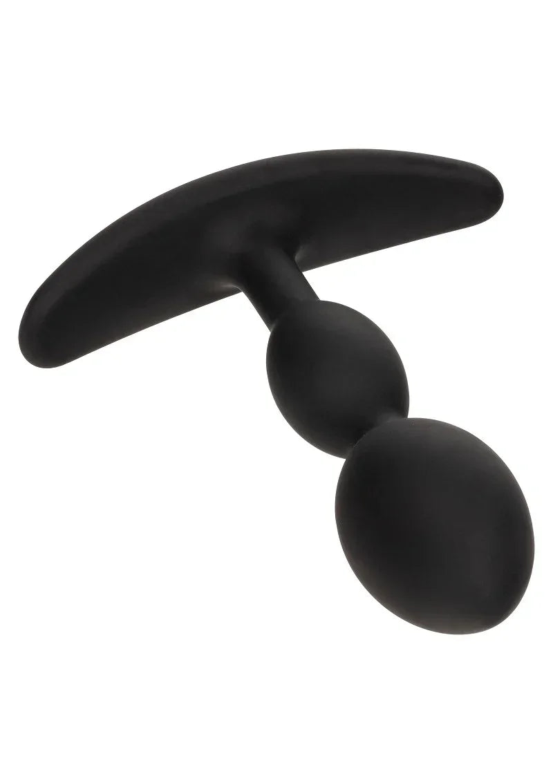 Close-up van zwarte teardrop anale plug met gebogen flens en glad oppervlak.