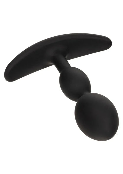 Close-up van zwarte teardrop anale plug met gebogen flens en glad oppervlak.