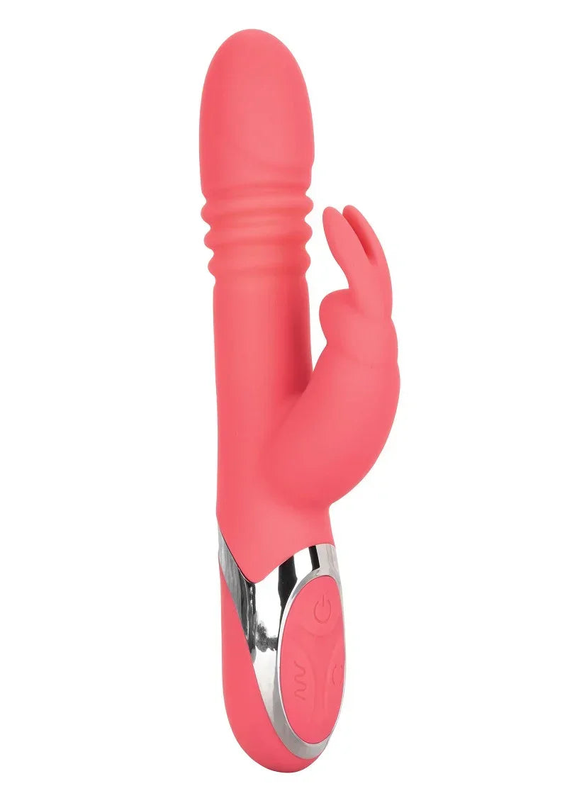 Roze konijnvibrator met dubbel kopstuk en ronde bedieningsknop op metalen basis