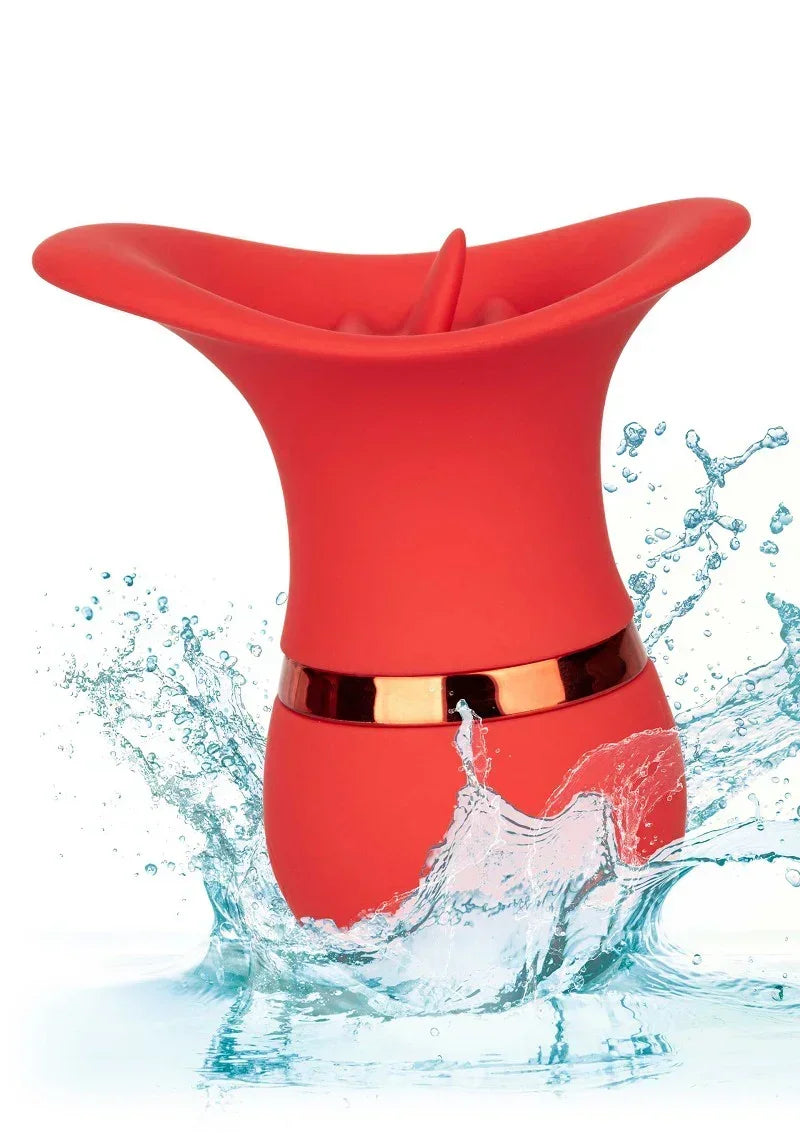 Rode teaser-vibrator met schijfkop, water spat om het apparaat
