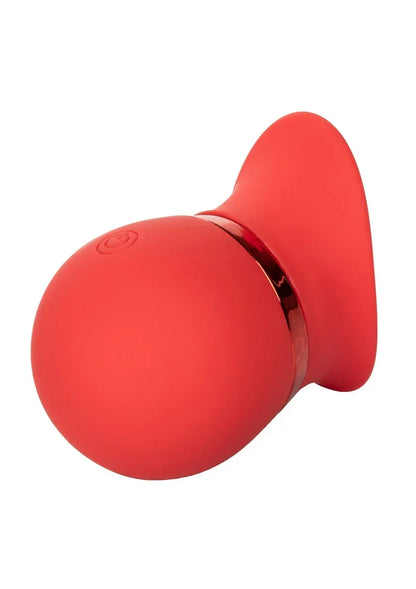 Ronde rode siliconen vibrator met gouden details en bedieningsknop aan zijkant