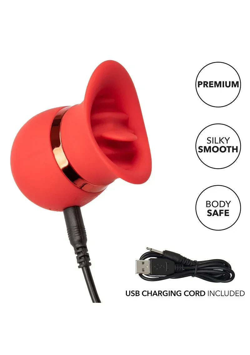 Rode siliconen vibrator met gouden ring en meegeleverde USB-oplaadkabel