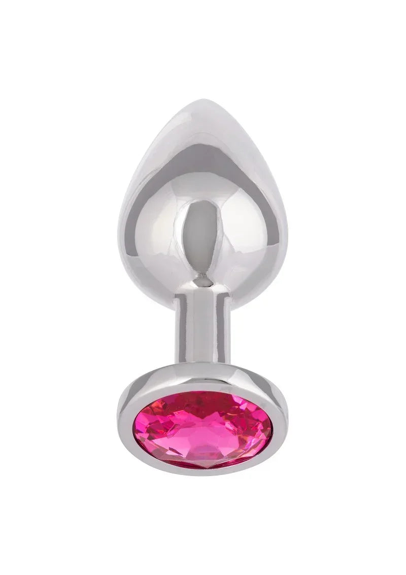 Glanzende metalen anale plug met druppelvormige flens en roze edelsteen vooraan.