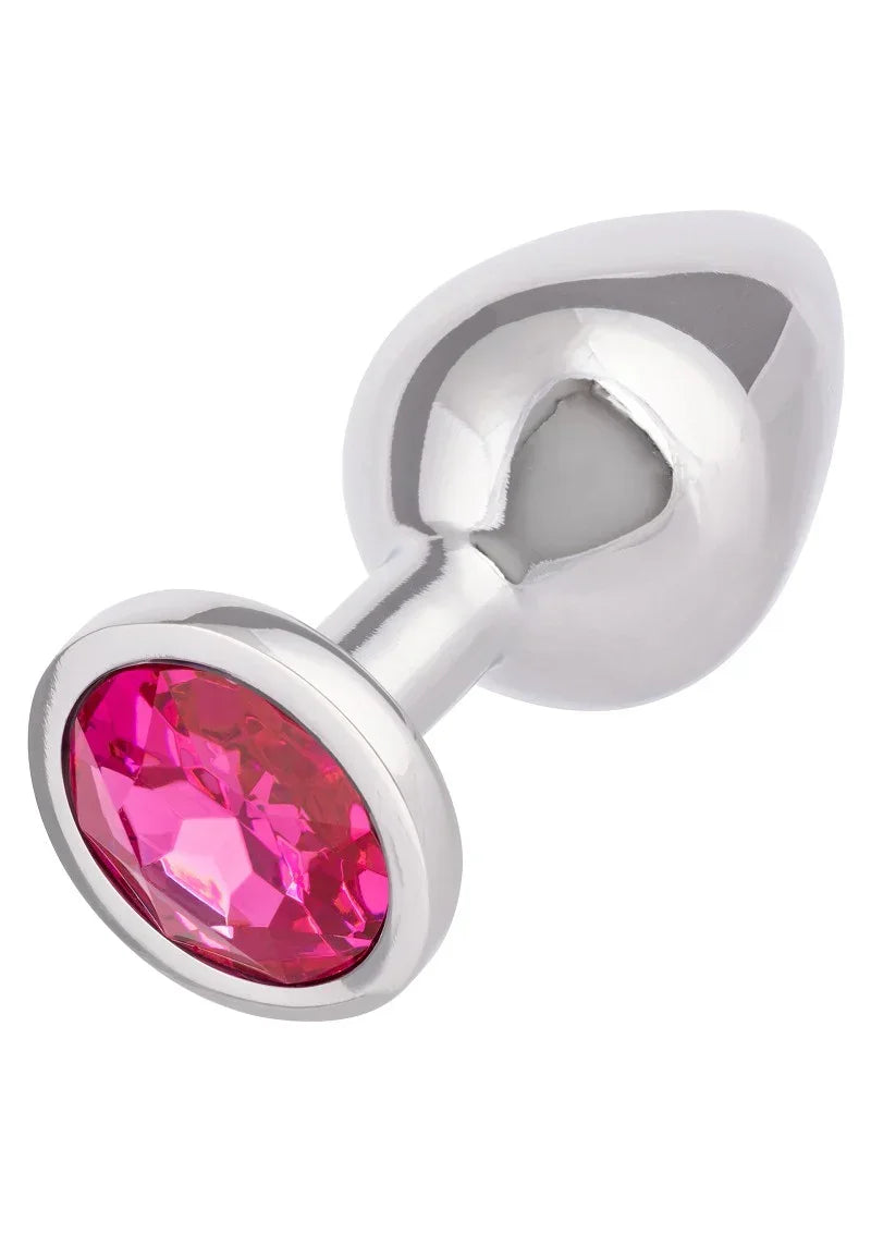 Metalen anale plug met ovale roze edelsteen en afgeronde flensrand.