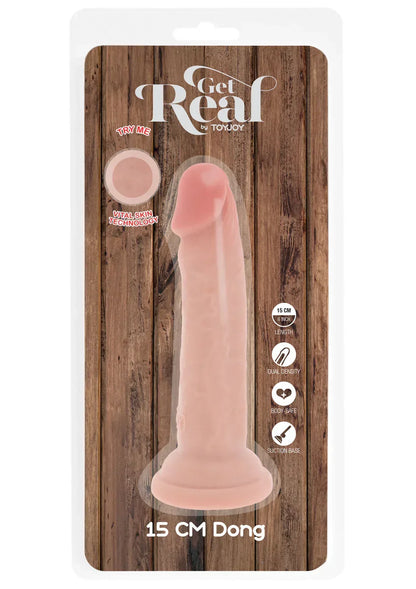 Verpakking met roze 15 cm dildo; product in blister op houten achtergrond.