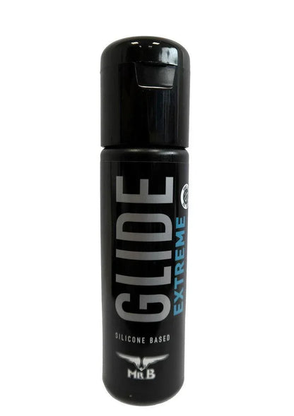 Siliconen glijmiddel in zwarte fles met zwarte dop, GLIDE Extreme label van Mister B.