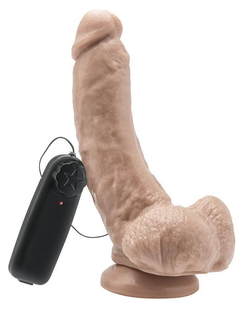 Beige kunstdildo met knobbels en vibrerende basis