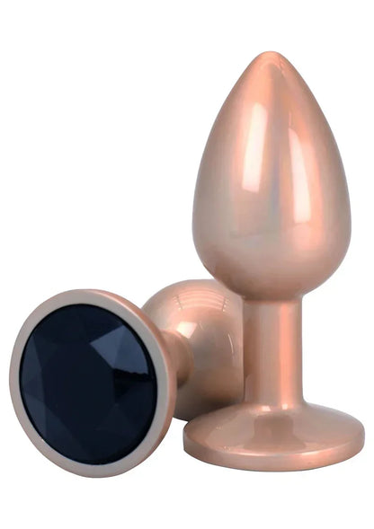 Roze-gouden buttplug met ronde voet en donkere kristalvormige inzet op de voorkant