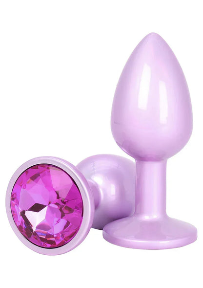 Roze/lila anale plug met brede voet en roze glinsterende facet-ring